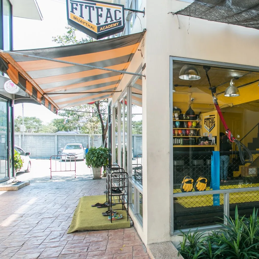 หน้าร้านมีกันสาดและป้าย FITFAC — FITFAC สาขาตลิ่งชัน